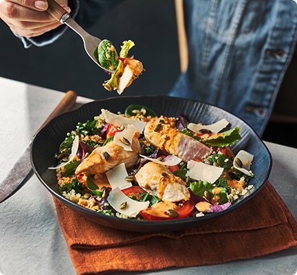 Step 4: Diner enjoying a Health Hub 15-minute Gousto dish—quick, balanced, and fresh.