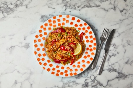 A bowl of Peri Peri Chicken with Red Pepper Rice